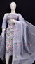 Mannequin displaying a stitched version of the Embroidered Kota Doria Dress Material in grey, featuring a semi-transparent embroidered top and dupatta with a plain cotton bottom.