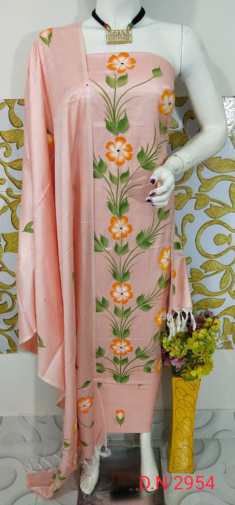Peach Hand-Painted Matka Tussar Silk Dress Material featuring orange floral motifs and lush green leaves. Ideal for festive celebrations and casual outings.