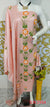 Peach Hand-Painted Matka Tussar Silk Dress Material featuring orange floral motifs and lush green leaves. Ideal for festive celebrations and casual outings.