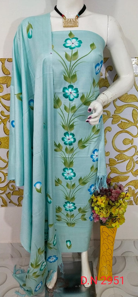 Sky Blue Hand-Painted Matka Tussar Silk Dress Material with vibrant blue and green floral motifs, featuring a matching dupatta and plain bottom fabric. Ideal for festive and formal events.