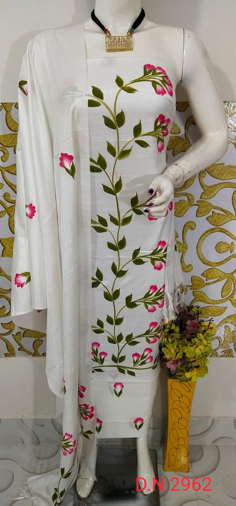 White Hand-Painted Matka Tussar Silk Dress Material featuring delicate pink floral motifs and a matching dupatta. Ideal for weddings, festive occasions, and formal events.