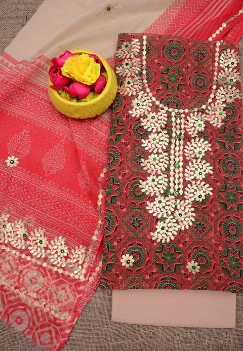 Flat lay of the unstitched Kota Doria Gota Patti suit set featuring red and beige fabric with floral embroidery.