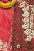 Close-up of the Gota Patti embroidery on the red Kota Doria fabric, showcasing intricate craftsmanship