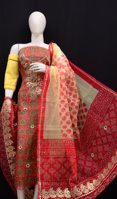 Kota Doria Gota Patti Suit Set in red and yellow combination with intricate embroidery displayed on a mannequin.