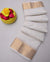 Folded view of the White Kota Cotton Saree showcasing embroidery.
