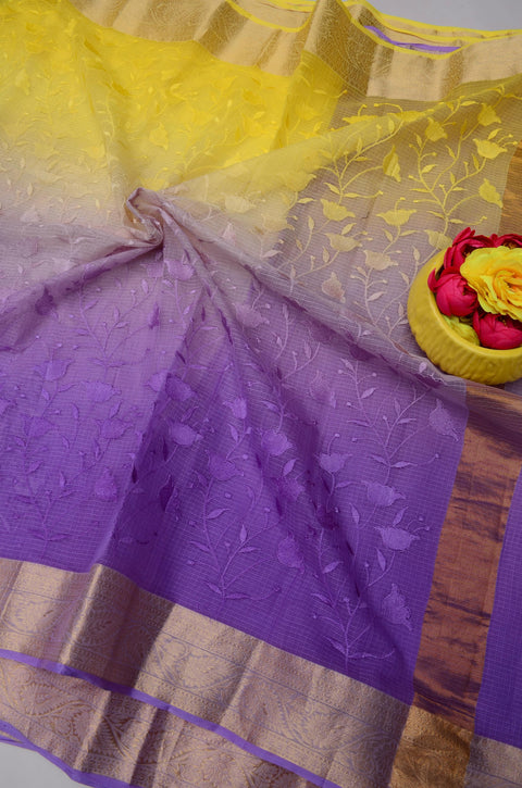 Open view of the saree with vibrant Yellow and Purple double-dye design.
