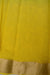Close-up of the golden border on the Rajasthani Kota Doria Saree.