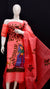 Rajasthani Kota Hand Painted Suit in red displayed on a mannequin, highlighting its bold color and fine craftsmanship.