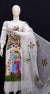  White Kota Hand Painted Suit displayed on a mannequin, highlighting the elegant patterns.