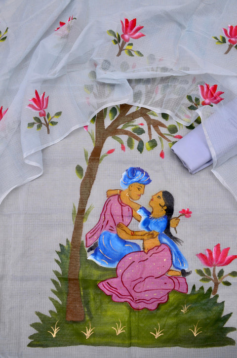 Close-up view of grey Kota Doria fabric with hand-painted blooming flowers and artistic motifs.