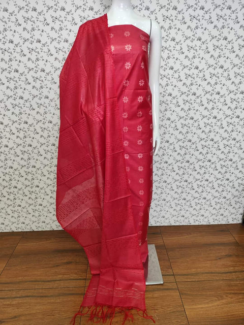 Rich red Semi Tussar Silk dress material with woven motifs, featuring a matching dupatta and plain bottom fabric. Perfect for weddings, parties, and festive occasions.