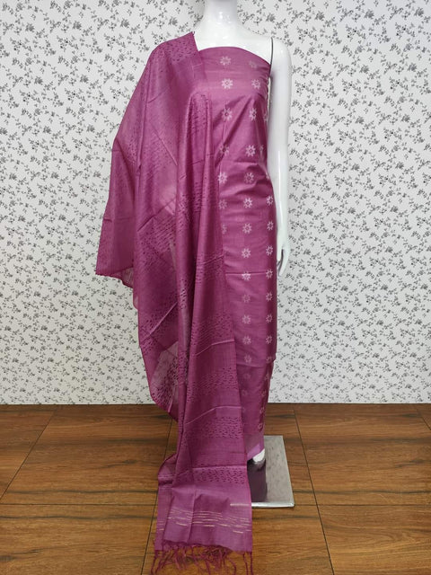 Royal Pink Semi Tussar Silk dress material with delicate woven motifs, matching dupatta, and plain bottom fabric. Ideal for festive occasions, weddings, and casual gatherings.