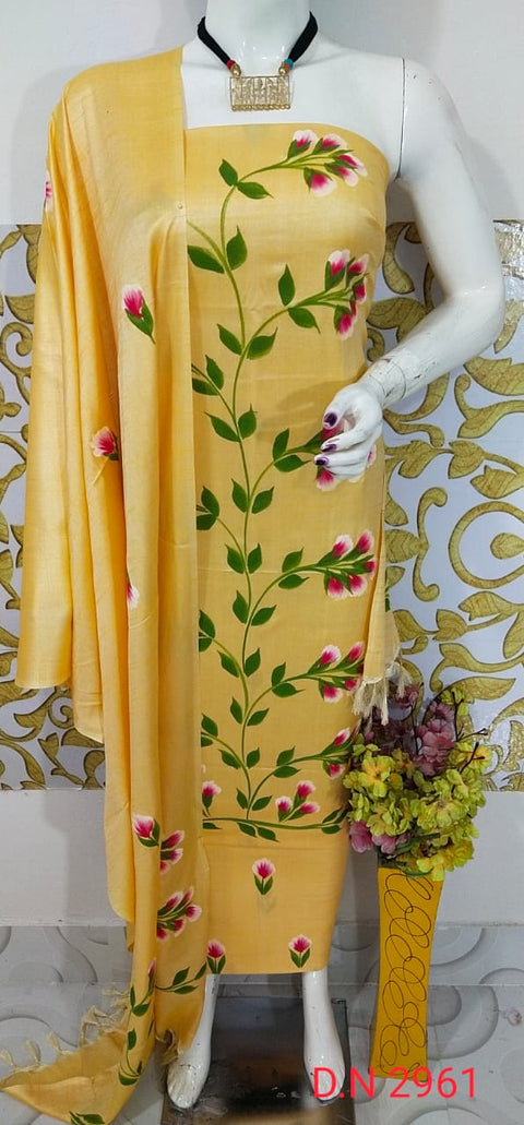 Yellow Hand-Painted Matka Tussar Silk Dress Material with vibrant floral motifs, featuring a matching dupatta and plain bottom fabric. Ideal for festivals and formal occasions.