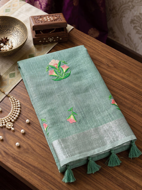 Sea Green Linen Saree with Floral Embroidery Border & Tassels